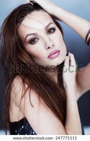 Beauty portrait of girl in top with sequins