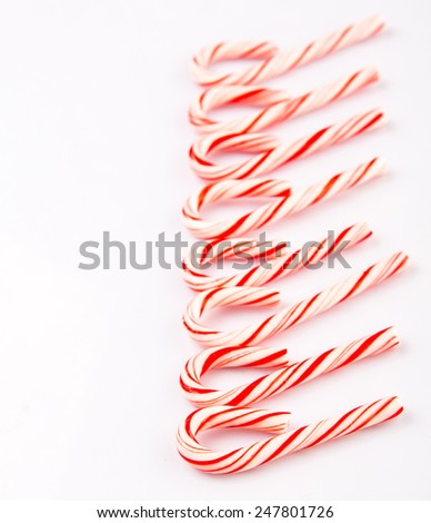 Mint Christmas colors candy cane over white background