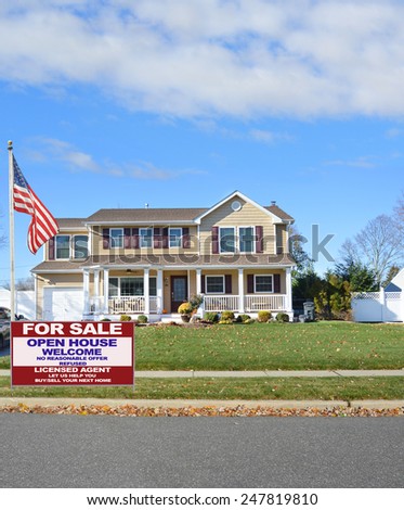 American flag pole Real estate for sale open house welcome sign Suburban home autumn day residential neighborhood USA