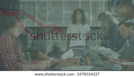 Image of data processing over diverse business people working in office. Global business, finances, computing and data processing concept digitally generated image.