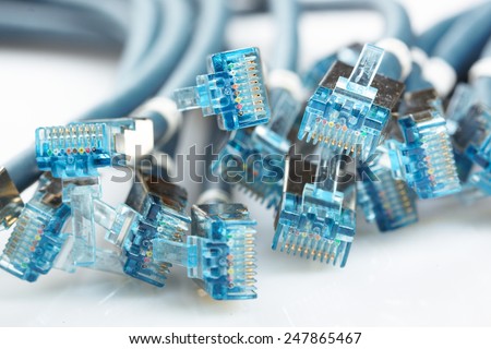 network cable with RJ45 connectors Royalty-Free Stock Photo #247865467