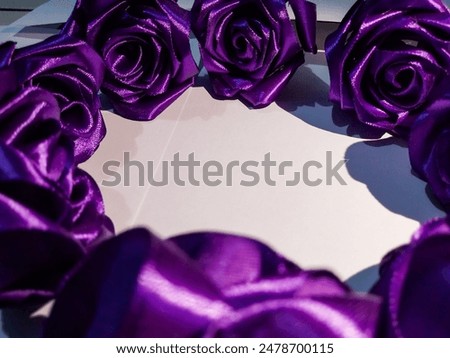 a photo of a group of purple flowers in the shape of a circle with a white background