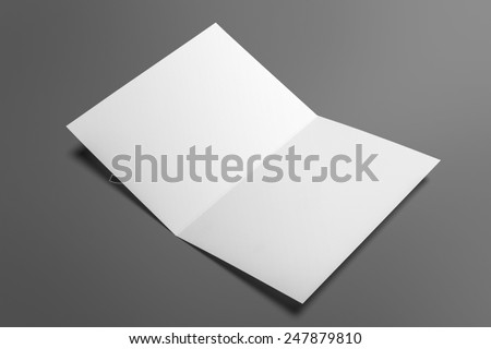 Blank invitation greetings card isolated on grey to replace your design Royalty-Free Stock Photo #247879810