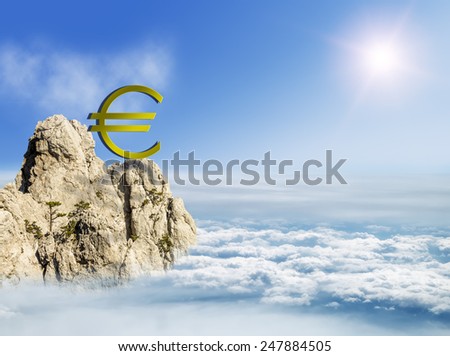 Euro sign on a mountain top among the clouds, business concept