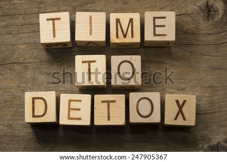 Time To Detox text on a wooden cubes on a wooden background Royalty-Free Stock Photo #247905367