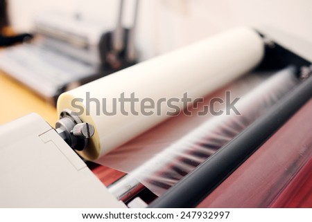 The image of a laminating machine