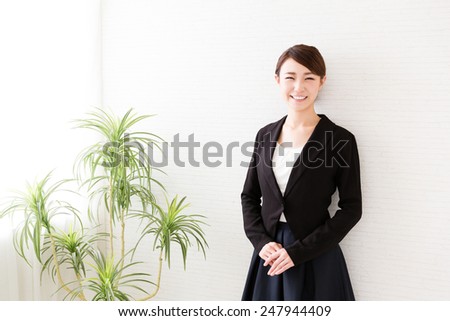 asian businesswoman relaxing in the office