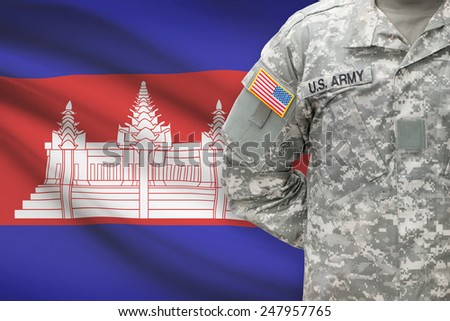 American soldier with flag on background - Cambodia