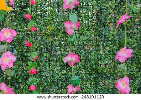 Wall artificial green grass and flowers