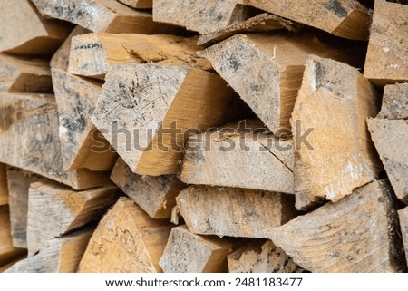 stack of chopped firewood close-up, a blank for heating a house