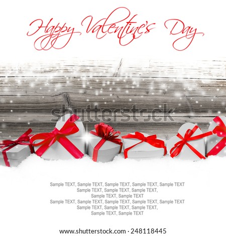 Heart shaped gifts on wooden background with white space for text