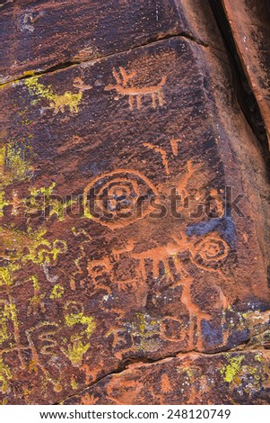Close up of North American petroglyph panel etched on stone