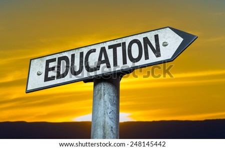 Education sign with a sunset background