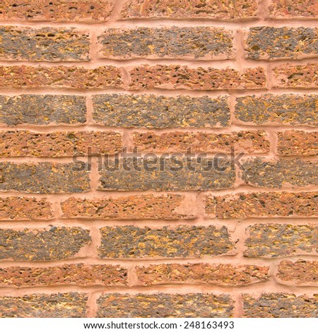 Close up old and weathered laterite wall tiles texture