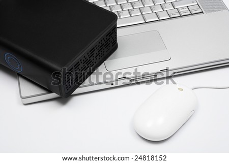 notebook, mouse and an external hard drive
