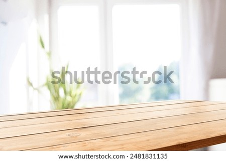 blurred background of window in kitchen with table