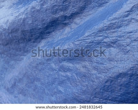 Close-up of a blue tarp weave