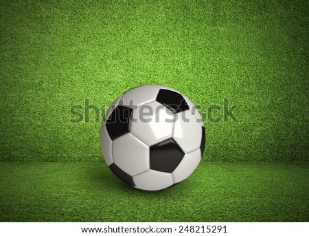 view of green striped football field with soccer ball
