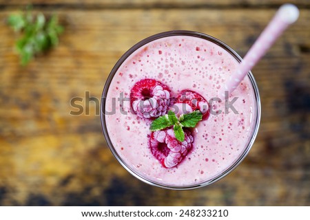Raspberry smoothie Royalty-Free Stock Photo #248233210