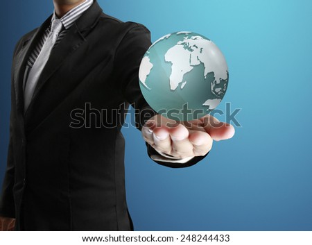 holding a glowing earth globe in his hands (NASA). Extremely detailed image including elements furnished by NASA 