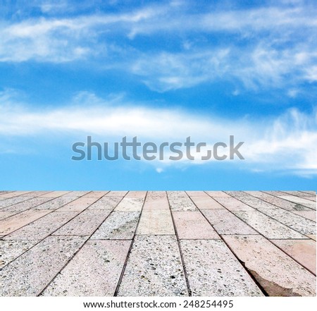 decorative paving stone on a background of blue sky