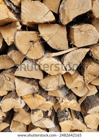 Stacked Cut and Chopped Wood for Fireplace, Bonfire or Campfire, Pattern Background