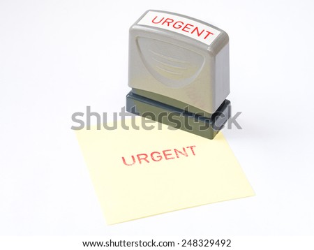 Urgent stamper and urgent red grunge office stamp on yellow paper