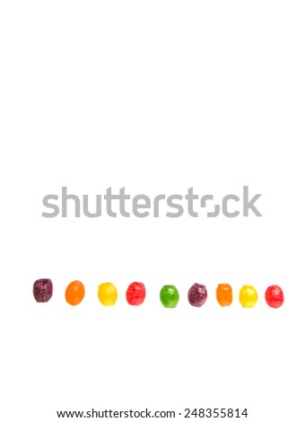 Assorted hard candy sweets over white background