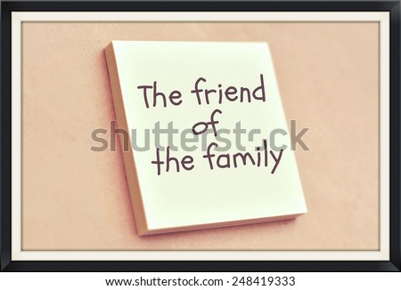 Text the friend of the family on the short note texture background