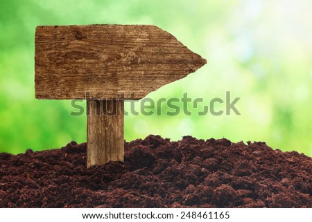 Signboard in spring soil