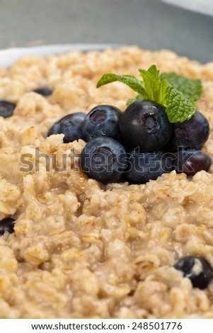 Porridge Oats with Berries for Breakfast. Macro. Selective focus.