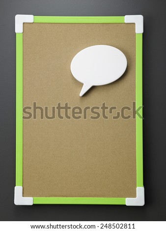 notice board with speech bubble on the gray background