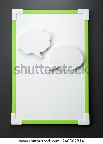 white board with speech bubble on the gray background