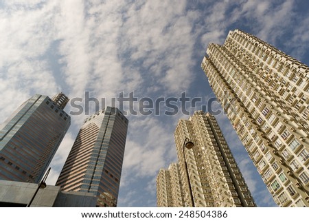 Apartment buildings in daytime under sky in Hong Kong, China, Asia.