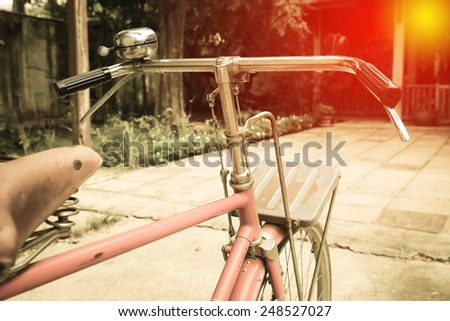 Retro bicycle in vintage filter.