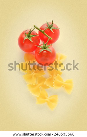 cherry tomatoes and curly pasta on a white background. picture in retro style