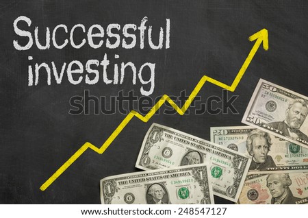 Text on blackboard with money - Successful investing