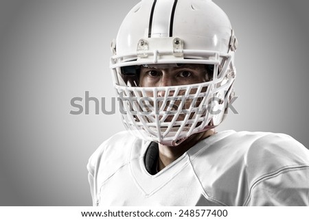 Close up of a Football Player with a white uniform on a white background.