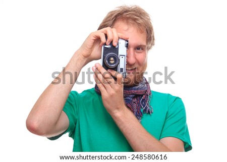 Portrait of man with classic camera - studio shoot 
