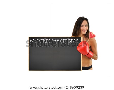 Woman holding heart shaped cookie lollipop new to Blackboard with valentines day gift for her isolated on white background