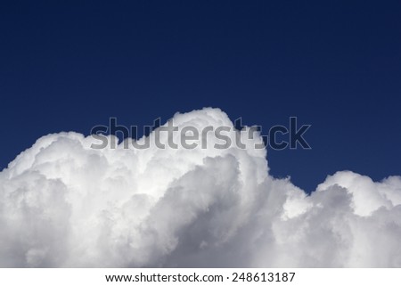 Cumulus clouds on blue sky