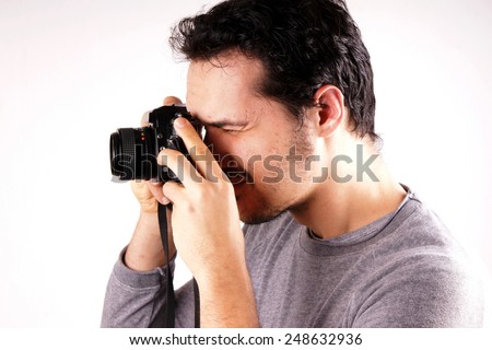 Man with analogic camera 