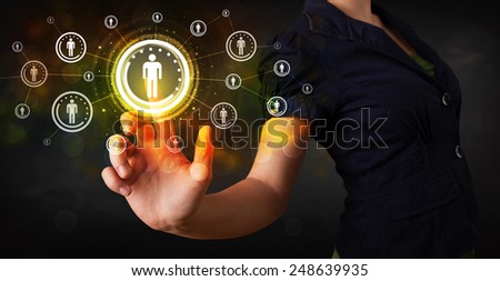 Young woman touching future technology social network button
