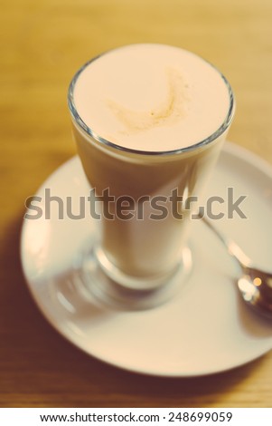 Latte cup in coffee shop - vintage effect style pictures