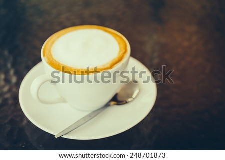 Latte coffee cup in white mug - vintage effect style pictures