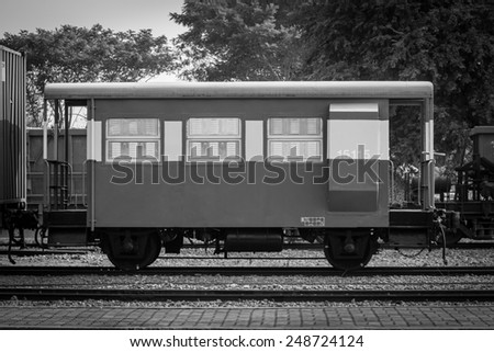 Black and white old carriages train.