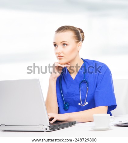 Young and professional doctor working in a medical office