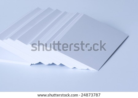 scatter batch of blank thick paper for business cards