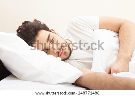 Sleeping man Royalty-Free Stock Photo #248771488