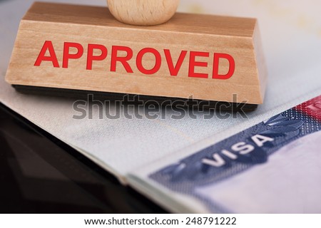 Close-up Photo Of Approved Stamp On Visa Royalty-Free Stock Photo #248791222